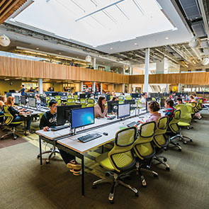 Students working in a computer lab. Read about What to Give
