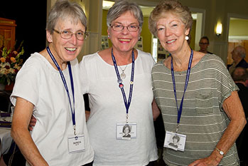 Photo of three women smiling for camera. Link to Life Stage Gift Planner Over Age 65 Situations.